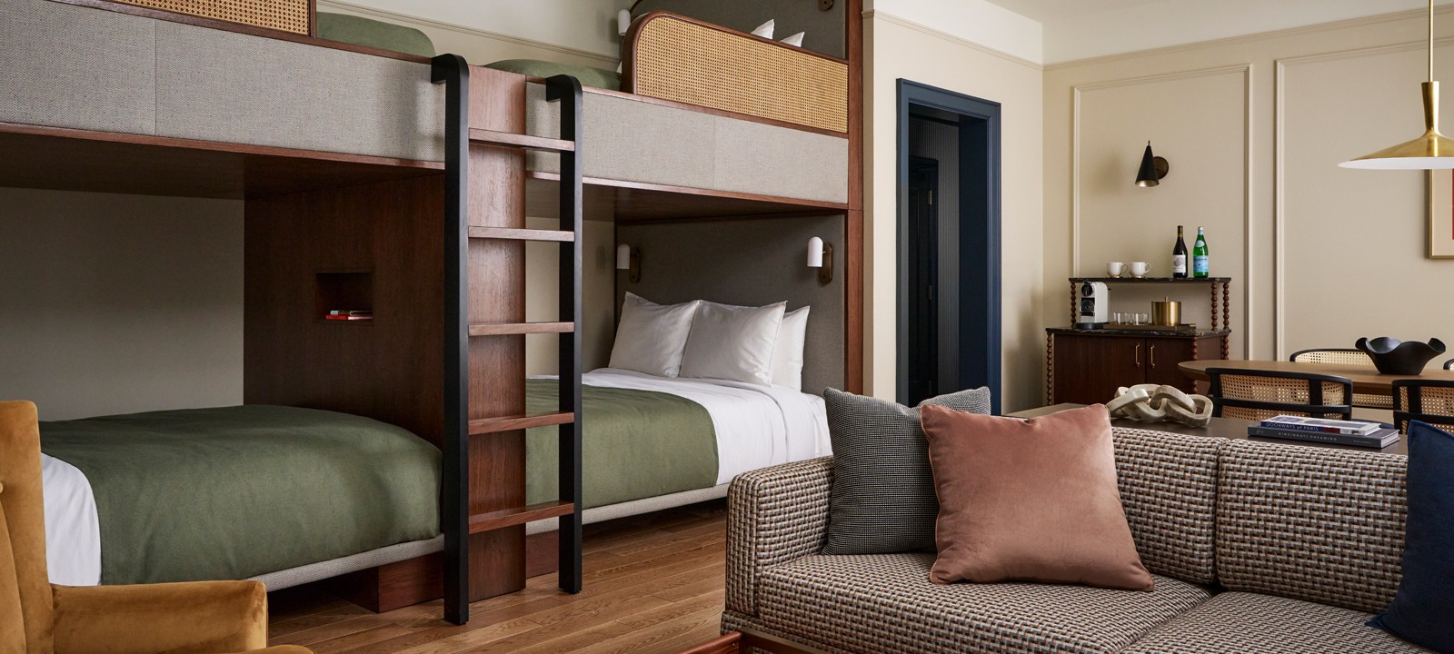 Built-in bunk beds sit against the wall within the large comfortable living area.